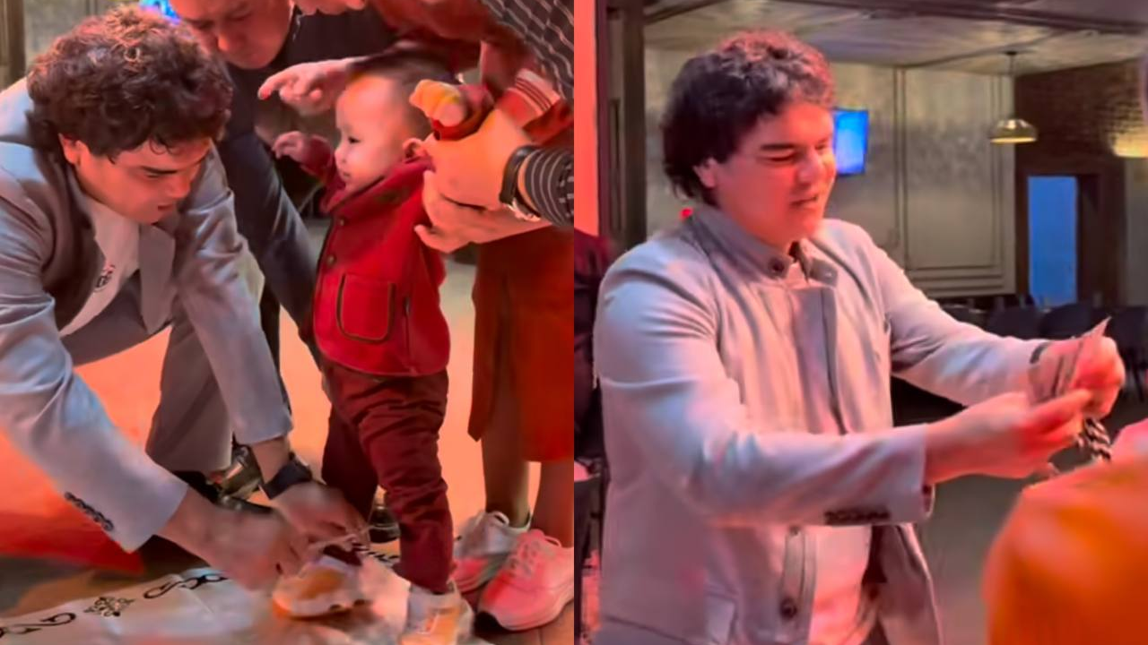 Әнші Кенжебек өзі тұсауын кескен балаға бір бума ақша сыйлай салды (ВИДЕО)